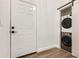 Convenient laundry area with a stackable washer and dryer for efficient space-saving at 1145 53Rd N Ave, St Petersburg, FL 33703