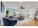 The living room offers comfortable seating, natural light, and hardwood floors at 1145 53Rd N Ave, St Petersburg, FL 33703
