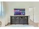 Cozy living room featuring a stylish entertainment center and open layout, perfect for relaxation at 1145 53Rd N Ave, St Petersburg, FL 33703