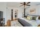 This main bedroom features an ensuite bathroom and hardwood floors at 1145 53Rd N Ave, St Petersburg, FL 33703