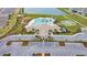 Aerial view of community featuring a pool, playground, tennis courts, and clubhouse at 11524 Sage Canyon Dr, Riverview, FL 33578