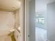 Bathroom features granite countertop, white cabinets, and tub with shower at 11524 Sage Canyon Dr, Riverview, FL 33578