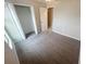 Bright bedroom with carpet flooring and a spacious closet at 11524 Sage Canyon Dr, Riverview, FL 33578