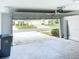 Spacious garage with an automatic door, providing secure parking and additional storage space at 11524 Sage Canyon Dr, Riverview, FL 33578