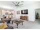 Open concept living space, seamlessly connected to the kitchen and dining area, ideal for modern living at 12687 Retreat Pl, Spring Hill, FL 34610
