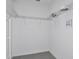 Walk-in closet featuring wire shelving for ample storage at 13548 Tropical Breeze Way, Hudson, FL 34669