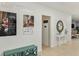 Well-lit hallway showcasing elegant design features and providing access to various rooms in the home at 13548 Tropical Breeze Way, Hudson, FL 34669