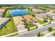 Aerial view of homes surrounding a scenic lake in a well-maintained community at 15525 Corona Del Mar Dr, Wimauma, FL 33598