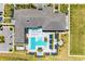 Overhead aerial view of community pool, cabanas, lounge chairs, and sun deck area at 15525 Corona Del Mar Dr, Wimauma, FL 33598