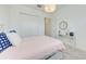 Bright bedroom with modern decor, closet, neutral carpet, and a comfortable, inviting atmosphere at 15525 Corona Del Mar Dr, Wimauma, FL 33598