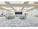 Large event space showcasing elegant lighting and ample seating, ideal for hosting gatherings at 15525 Corona Del Mar Dr, Wimauma, FL 33598