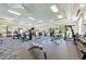 Bright fitness center with weights, machines, and mirrors at 15525 Corona Del Mar Dr, Wimauma, FL 33598