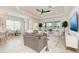 Bright living room with modern furnishings and a view of the outdoors at 15525 Corona Del Mar Dr, Wimauma, FL 33598