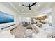 Open floor plan featuring a spacious living room and modern kitchen with large island at 15525 Corona Del Mar Dr, Wimauma, FL 33598