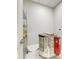 Room with utility kiln and wire rack at 15525 Corona Del Mar Dr, Wimauma, FL 33598