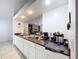Spacious kitchen with granite countertops and ample cabinet space at 1599 Mcauliffe Ln, Palm Harbor, FL 34683