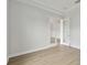 An office area with double glass paneled doors and luxury vinyl flooring at 174 Hidden Estates Ct, Brandon, FL 33511