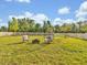 Inviting backyard with well-manicured lawn and comfortable seating at 17845 Cortes Creek Blvd, Spring Hill, FL 34610