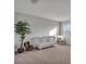Bright Bedroom with a white crib, natural light, and decorative tree adding a cozy touch at 17845 Cortes Creek Blvd, Spring Hill, FL 34610