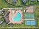 Active community with a swimming pool, tennis, and basketball courts for outdoor fun at 17845 Cortes Creek Blvd, Spring Hill, FL 34610