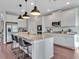 Gorgeous kitchen with granite countertops, stainless steel appliances and pendant lighting at 17845 Cortes Creek Blvd, Spring Hill, FL 34610