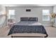 Inviting main bedroom showcasing natural light, carpet floors, and a cozy vibe at 17845 Cortes Creek Blvd, Spring Hill, FL 34610