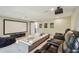 Home theater room featuring large screen, comfortable seating, projector, and recessed lighting at 17914 Bramshot Pl, Lutz, FL 33559