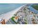 Aerial view of beachside condos with ocean views, parking, and coastal road access at 17980 Gulf Blvd # 505, Redington Shores, FL 33708