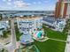 Beautiful waterfront condo complex with pool, lush landscaping, and bay views at 17980 Gulf Blvd # 505, Redington Shores, FL 33708