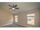 Spacious bedroom with vaulted ceilings, plush carpets, and lots of natural light at 19247 Otters Wick Way, Land O Lakes, FL 34638