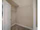 Walk-in closet with shelving and carpet at 19247 Otters Wick Way, Land O Lakes, FL 34638