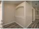Open entryway with arched accents and stylish flooring at 19247 Otters Wick Way, Land O Lakes, FL 34638