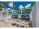Outdoor grilling area with well-maintained grills, ideal for summer cookouts and gatherings at 19247 Otters Wick Way, Land O Lakes, FL 34638