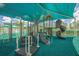Charming playground area with slides and climbing structures under a shaded canopy at 19247 Otters Wick Way, Land O Lakes, FL 34638