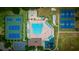 Overhead view of community pool, tennis courts, basketball courts, playground, and clubhouse at 19247 Otters Wick Way, Land O Lakes, FL 34638