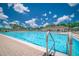 Large outdoor pool with deck chairs, perfect for enjoying the Florida sunshine at 19247 Otters Wick Way, Land O Lakes, FL 34638