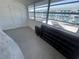 A serene room filled with natural light from the window and cool tiled flooring makes a bright and airy space at 2011 58Th N Ave # 20, St Petersburg, FL 33714