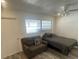 This inviting bedroom boasts natural light, a comfortable bed, and a neutral color palette, creating a serene and relaxing atmosphere at 2011 58Th N Ave # 20, St Petersburg, FL 33714