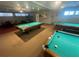 Recreational billiard room featuring multiple pool tables, providing an engaging social and entertainment space at 2011 58Th N Ave # 20, St Petersburg, FL 33714