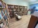 Cozy library with extensive bookshelves and a comfortable chair, providing a quiet space for reading at 2011 58Th N Ave # 20, St Petersburg, FL 33714
