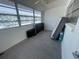 Sunroom filled with sunlight, and tiled floors offers a serene spot to unwind while providing ample natural light at 2011 58Th N Ave # 20, St Petersburg, FL 33714