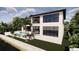 Gorgeous backyard with a pool, outdoor seating, a waterfront view, and black frame windows at 2019 Illinois Ne Ave, St Petersburg, FL 33703