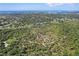 Scenic aerial view of a park and golf course, with green spaces and a walking labyrinth at 2048 64Th S Ave, St Petersburg, FL 33712