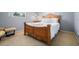 Comfortable bedroom with a wooden bed frame, soft lighting, and neutral colors for a relaxing atmosphere at 2048 64Th S Ave, St Petersburg, FL 33712
