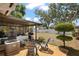 Outdoor patio with seating area, barbecue grill, and manicured backyard space, perfect for entertaining and relaxation at 2048 64Th S Ave, St Petersburg, FL 33712