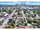 City view featuring beautiful tree-lined street, showcasing the urban landscape and neighborhood at 2107 W Carmen St, Tampa, FL 33606