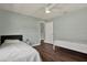 Bright bedroom with pale green walls and two twin beds at 2107 W Carmen St, Tampa, FL 33606