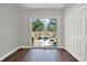 Bedroom showcasing sliding doors to the backyard and a spacious closet at 2107 W Carmen St, Tampa, FL 33606
