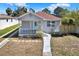 Cozy single-story home with a covered porch and charming curb appeal at 2107 W Carmen St, Tampa, FL 33606