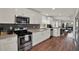 Modern kitchen featuring stainless steel appliances and ample counter space at 2107 W Carmen St, Tampa, FL 33606